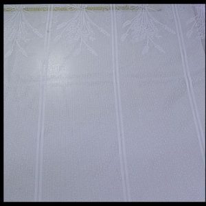 Elegant White windowed Dutch lace with natural wheat imprints