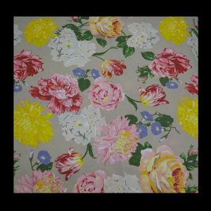 Exclusive tan cotton with eyecatching floral brocade