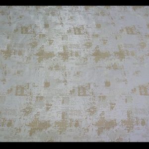 Earthtoned cream polyhester fabric with gold leaf textured design